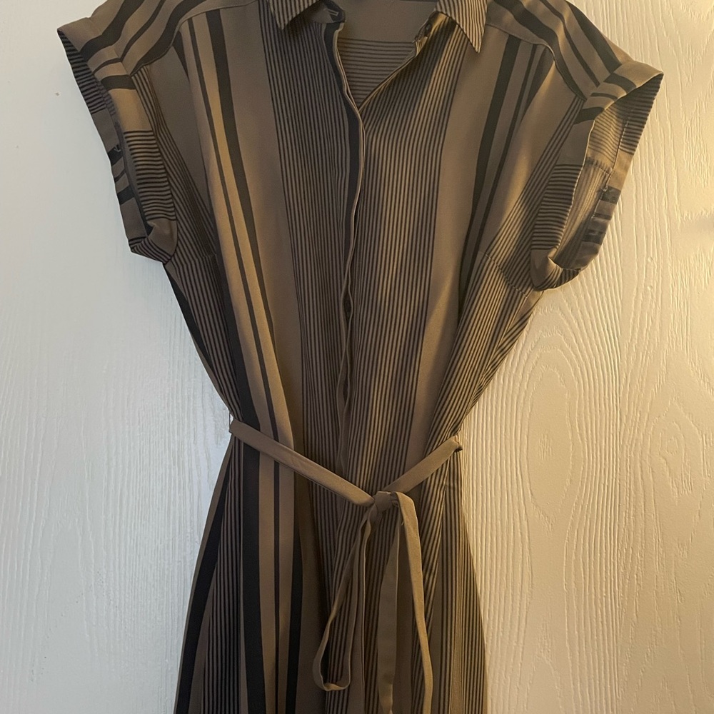 Dress by Express 100% Polyester women’s size medium.
